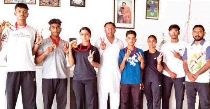 Wushu medal winners from Kaithal with their medals