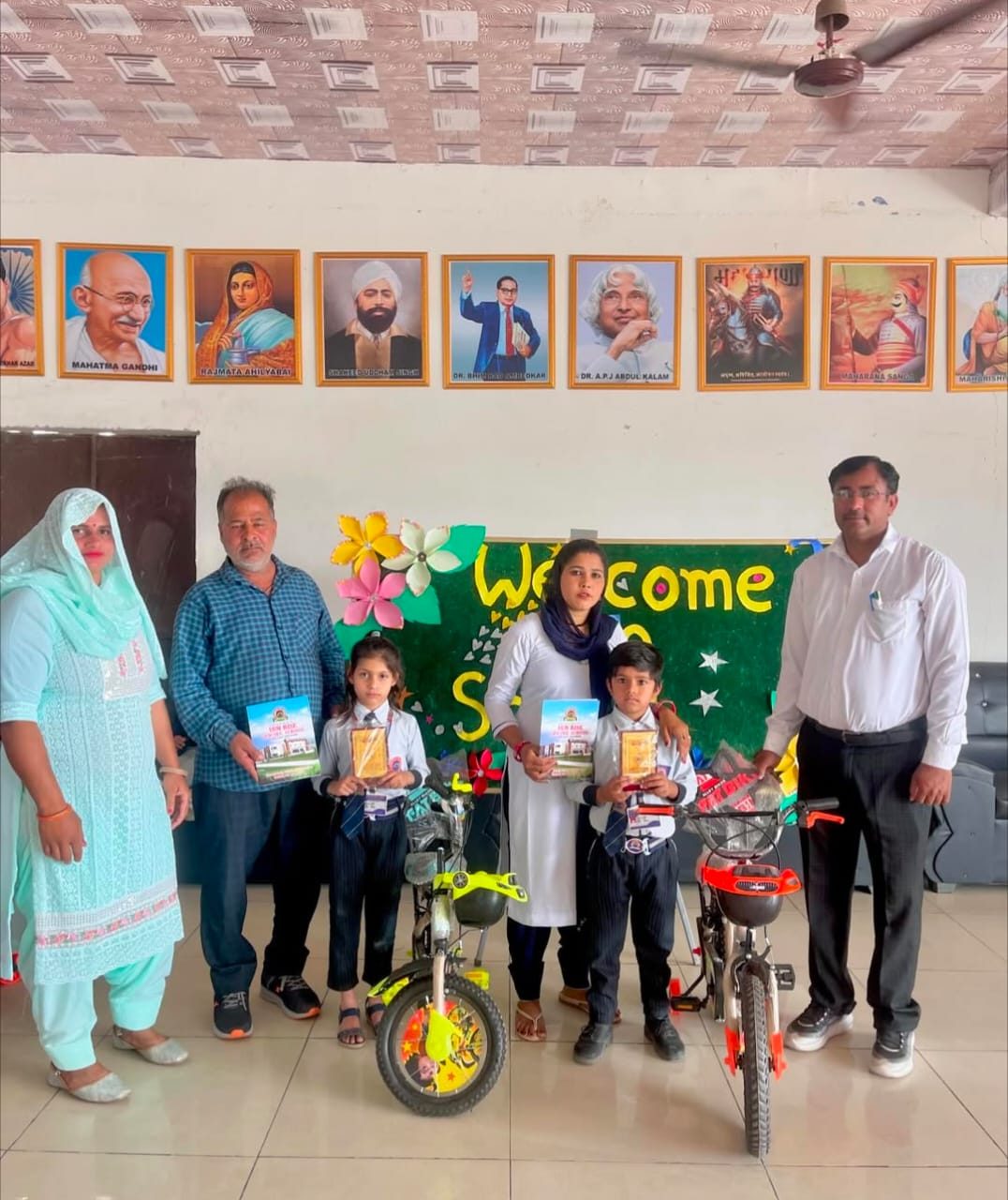 Young students awarded bicycles for excellence at Sun Rise School