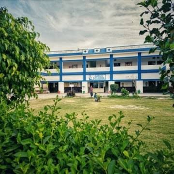 School building seen from the lawn