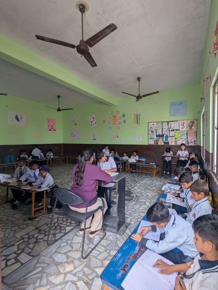 Primary students at work in their classroom