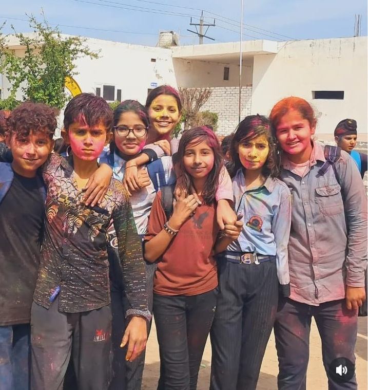 Students celebrating Holi