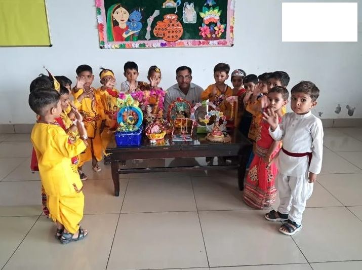 Pre-primary children in festive costumes at a school celebration
