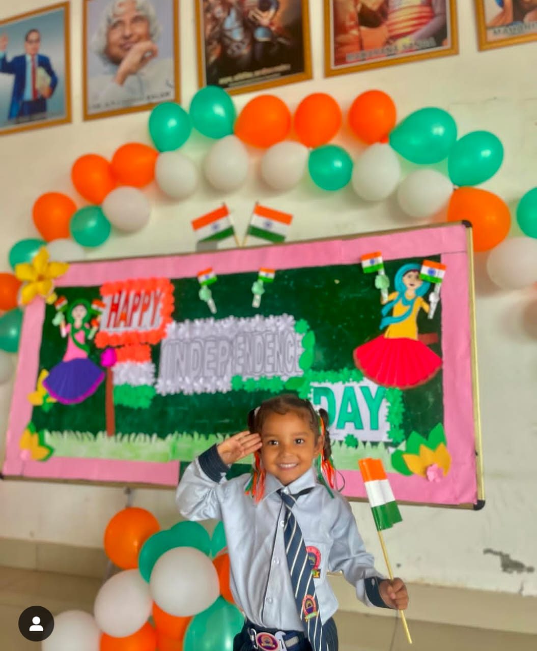 A young student salutes the Tiranga