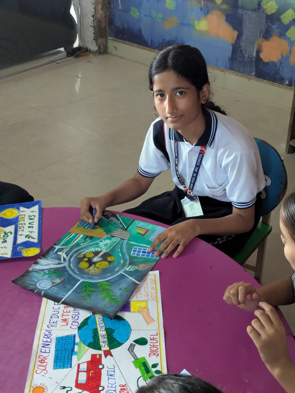 Student with her road-safety poster