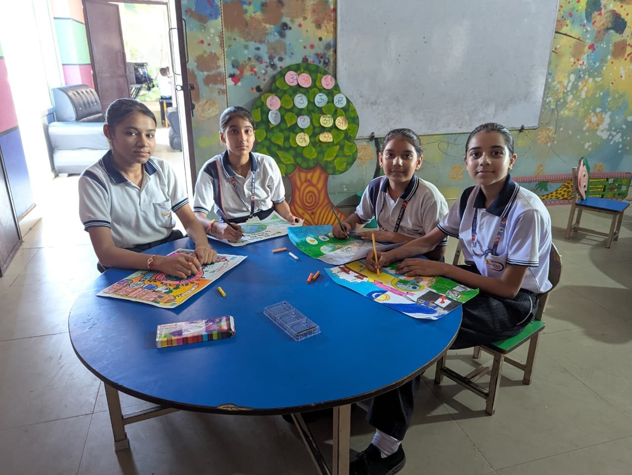 Middle school students at the poster-making competition