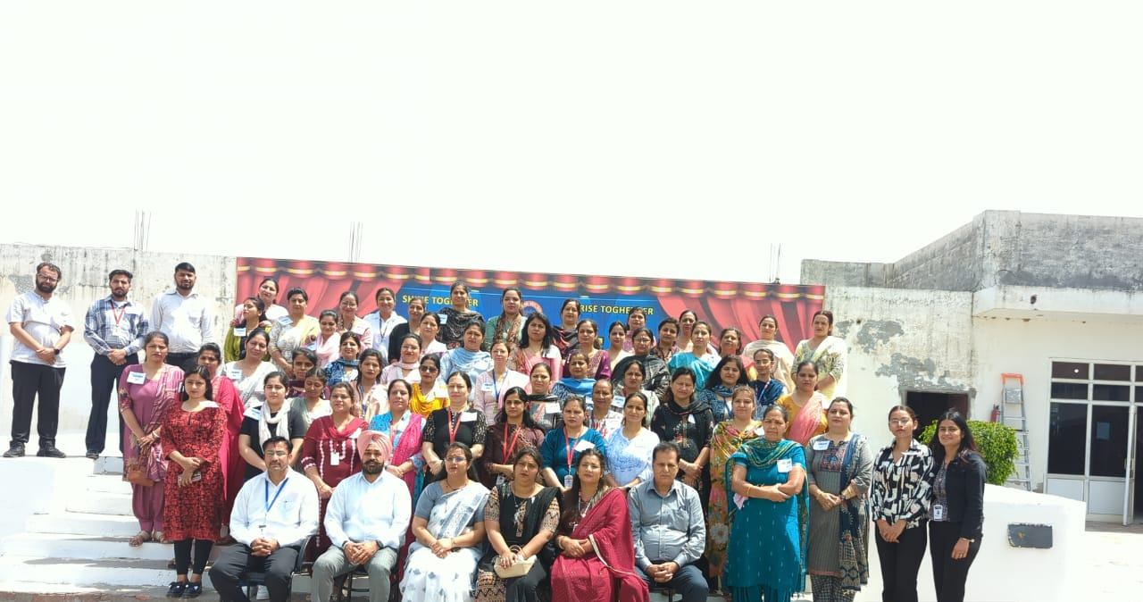 Group photo of teachers at a workshop