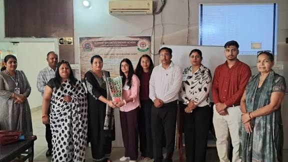 Teachers with resource persons after a workshop