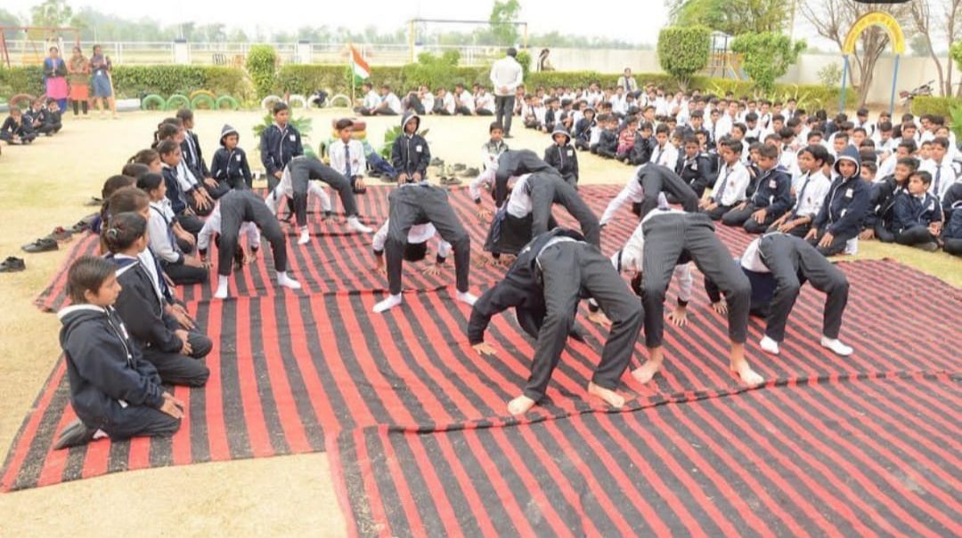Students performing yoga asanas