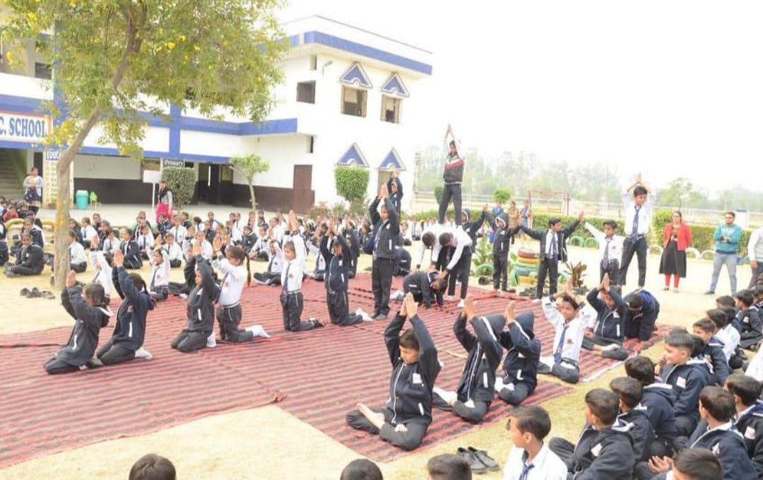 Yoga Day in front of the school building